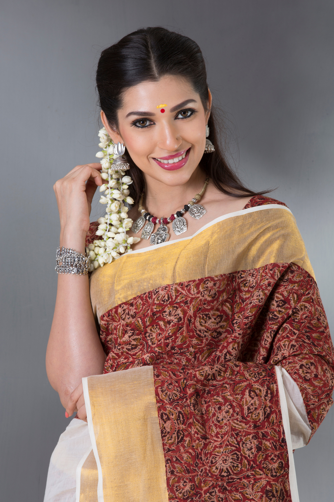 charming Indian woman in traditional saree